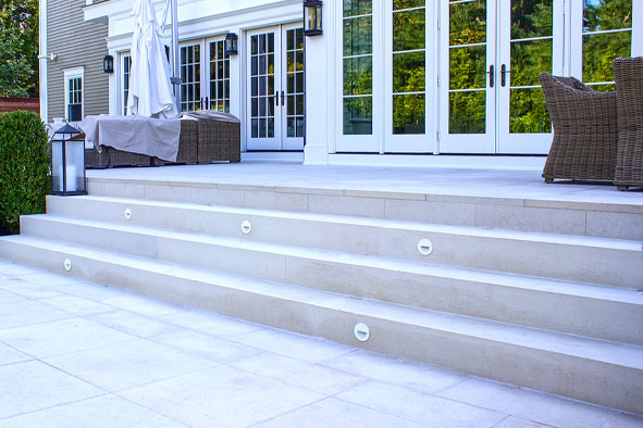 Patio steps leading up to home
